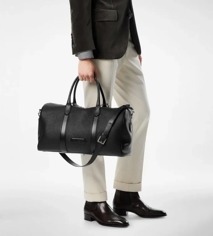 Bolso de viaje mediano de cuero granulado con abertura amplia
