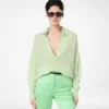 Jersey oversize de cuello polo abierto de cachemira y seda ultrasuaves Jersey oversize de cuello polo abierto de cachemira y seda ultrasuaves