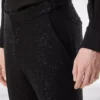 Pantalón ligero bouclé con lentejuelas
