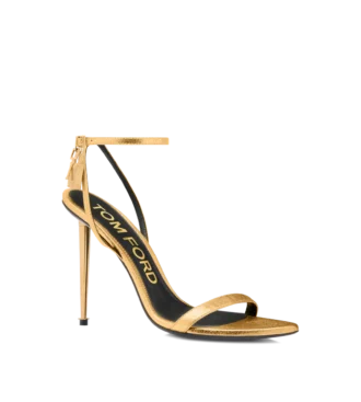 Sandalias puntiagudas sin talón con candado de cuero napa laminado