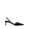Zapatos de salón con talón abierto y hebilla en T de piel brillante