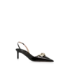 Zapatos de salón con talón abierto y hebilla en T de piel brillante